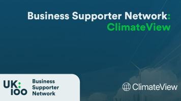 Business Supporter Network and ClimateView partnership announcement featuring UK100 logo with wind turbines in background on teal gradient design
