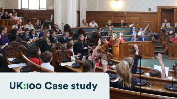 Stockport pupils taking part in a debate at the town hall